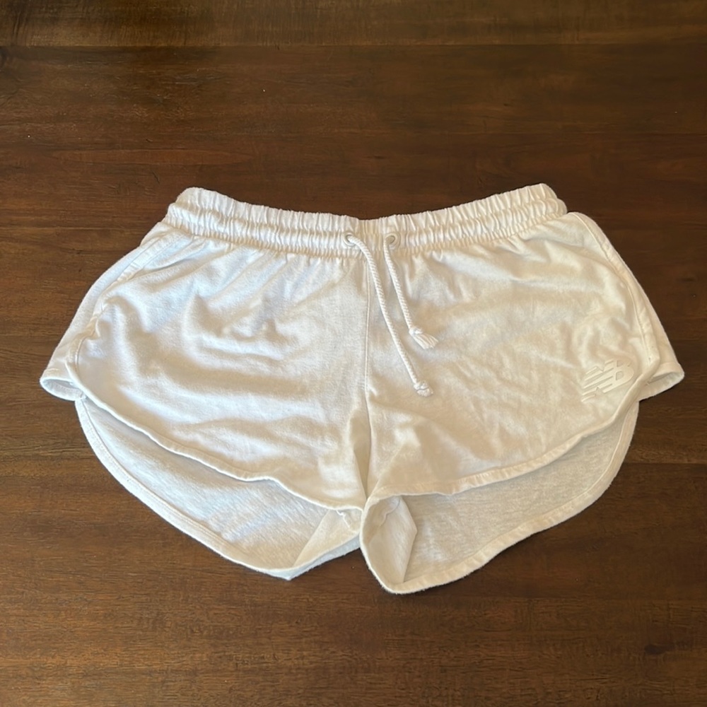 Super comfy cotton New Balance shorts with pockets. In great shape!